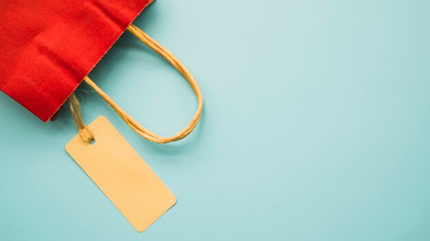 Red shopping bag on table 