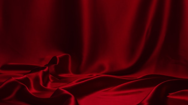 Красная шелковая или атласная текстура роскошной ткани