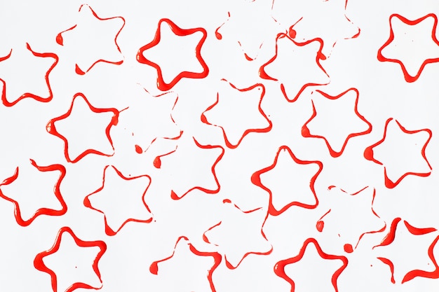 Red star-shaped stains