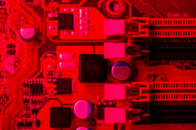 Red themed motherboard with slots