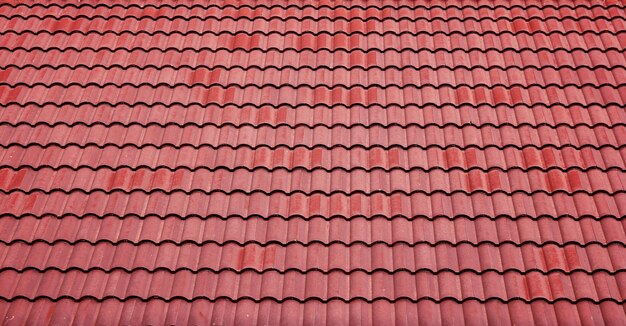 Red tiles roof background