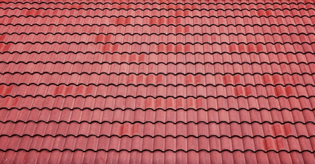 Red tiles roof background