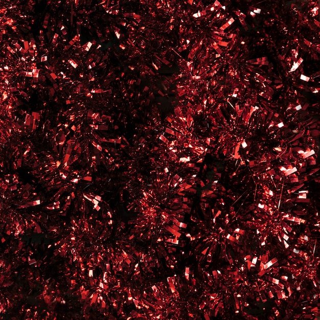 Red tinsel texture close up