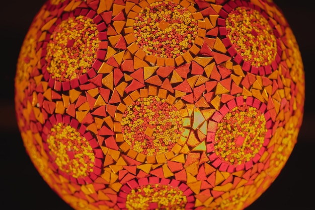 Red traditional handmade lantern selective focus on Turkish lamp blurred background popular souvenir lanterns in evening cafe