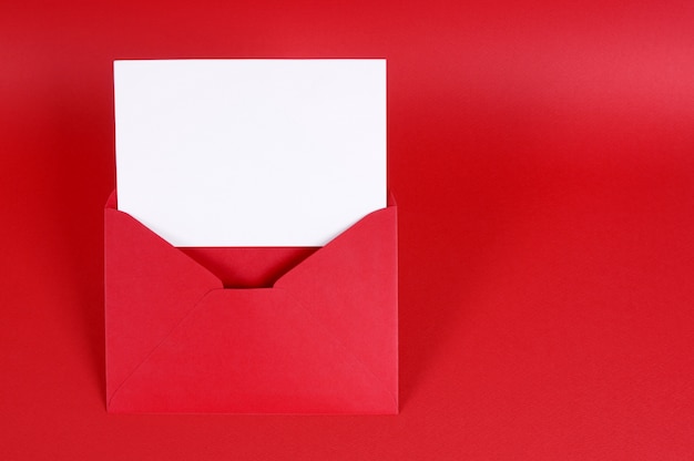 Red valentine envelope with a card