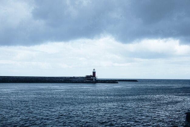 Red and white lighthouse scenery