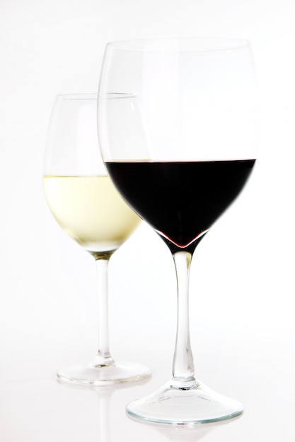 Red and white wine in glasses 