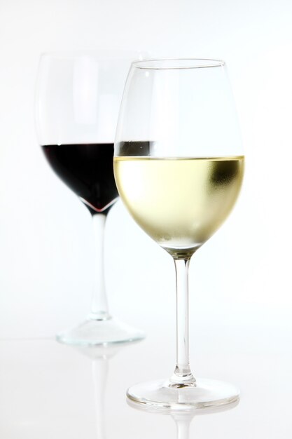 Red and white wine in glasses 