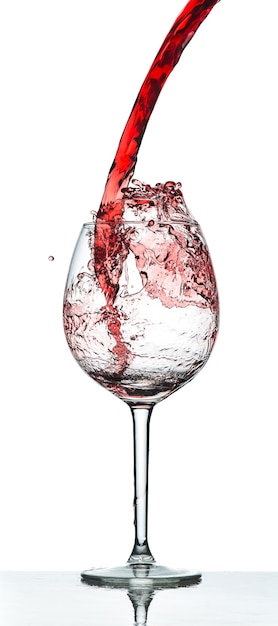 Free photo red wine splash over white background at studio