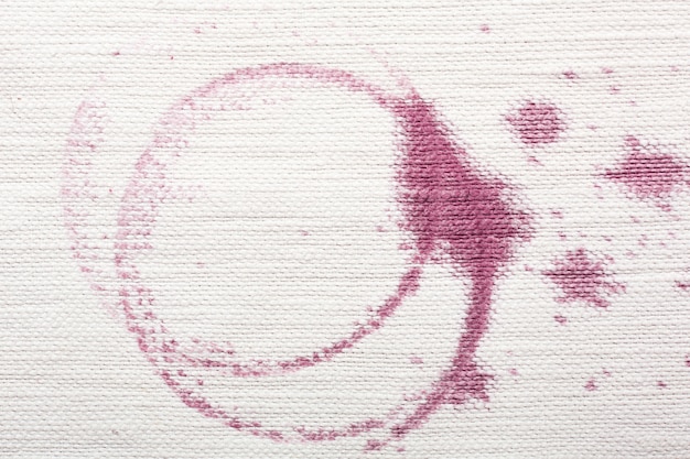 Red wine stains on white material