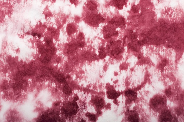 Red wine stains on white textile