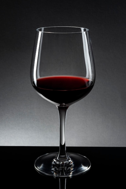 Red wine in wine glass isolated