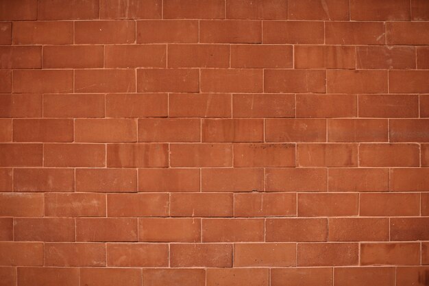 Reddish orange brick wall textured background