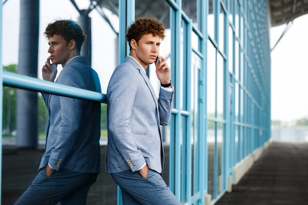 redhaired businessman talking on phone