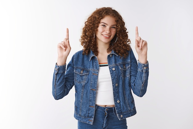 redhead girl pointing fingers up