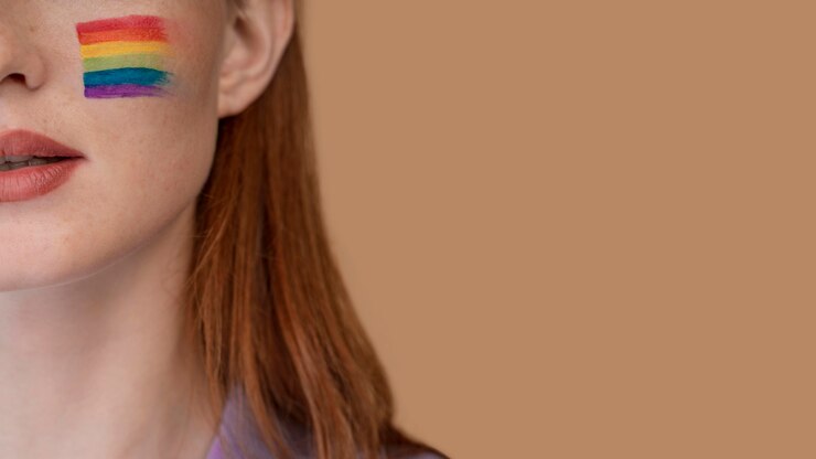 Free Photo redhead woman with rainbow symbol