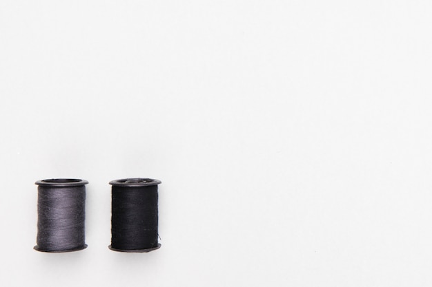 Reels of yarn on white background