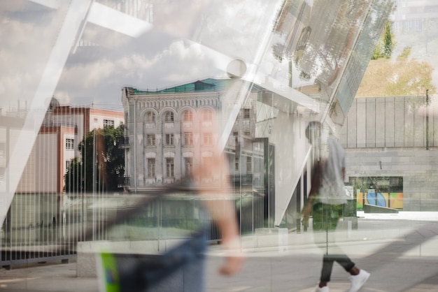 Reflection of walking people