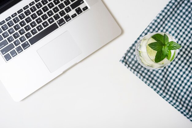 Refreshing drink and laptop