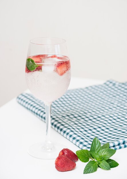 Refreshing drink on table cloth