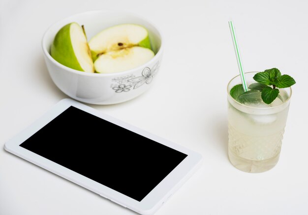 Refreshing drink with apples and tablet