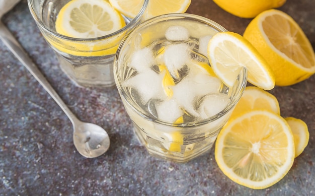 Refreshing drink with lemon and ice 