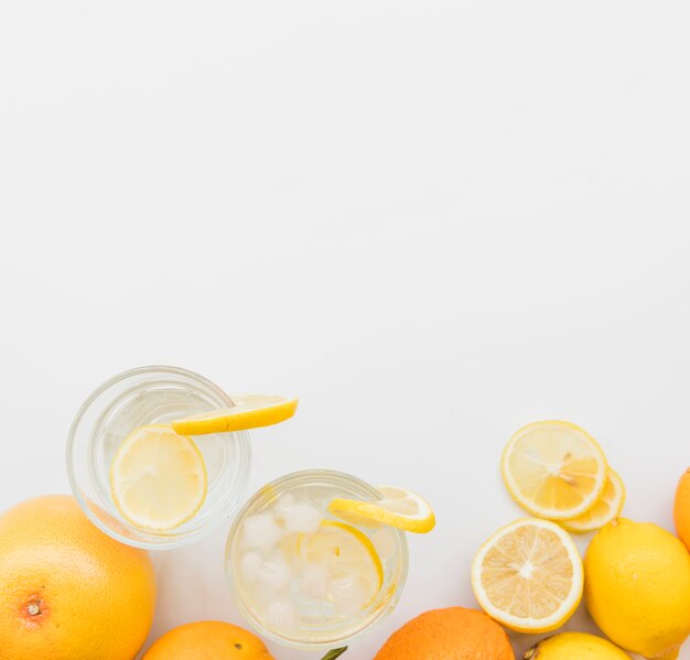 Refreshing lemon drinks and citrus fruits