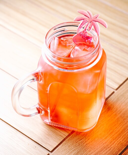 Refreshing lemonade with ice cubes