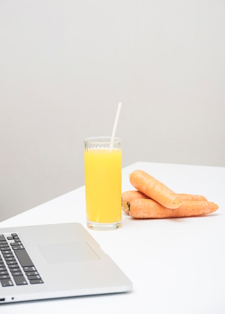Refreshing orange juice and carrots