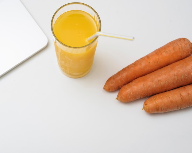 Refreshing orange juice and carrots