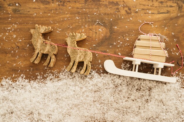 Reindeer pulling sledge with presents