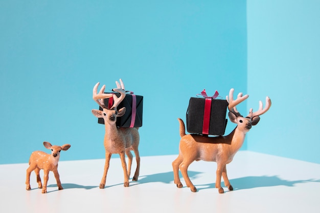 Free photo reindeers carrying christmas gifts