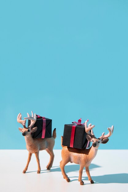 Reindeers carrying christmas presents