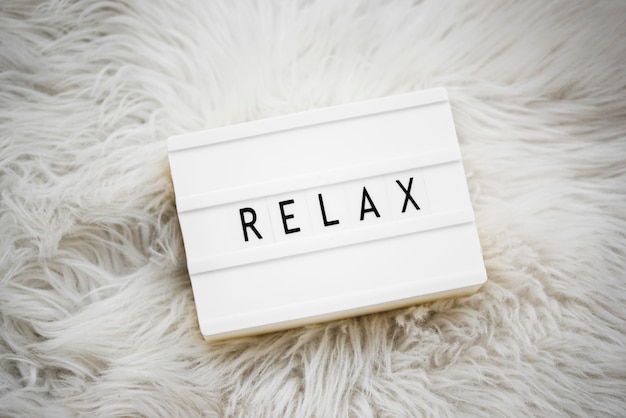 Free photo relax message on lightbox arrangement