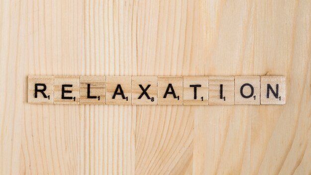 Relaxation word on wooden tiles 