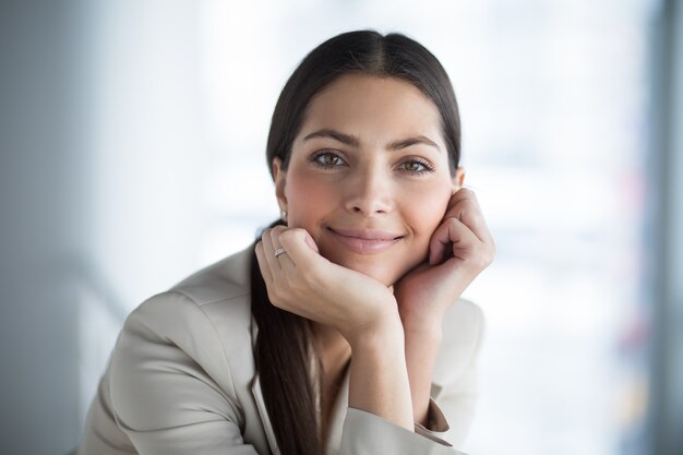 Relaxed Beautiful Business Lady Leaning on Hands