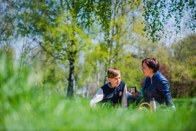 Relaxed child talking to his mother