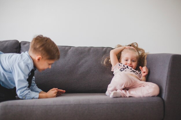 Relaxed children on sofa