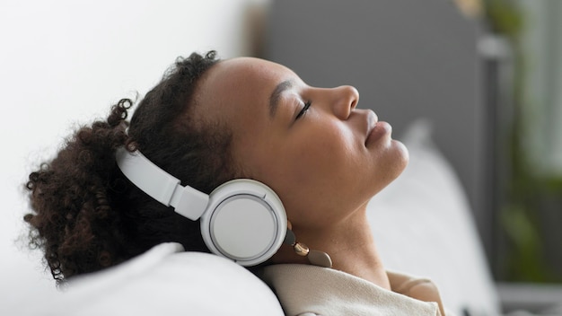 Relaxed woman wearing headphones