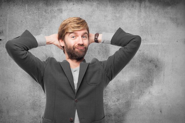 Relaxed worker with hands on head