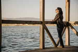 Free photo relaxed young woman outdoors