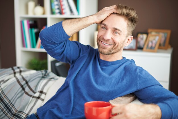 Relaxing at home with cup of good coffee