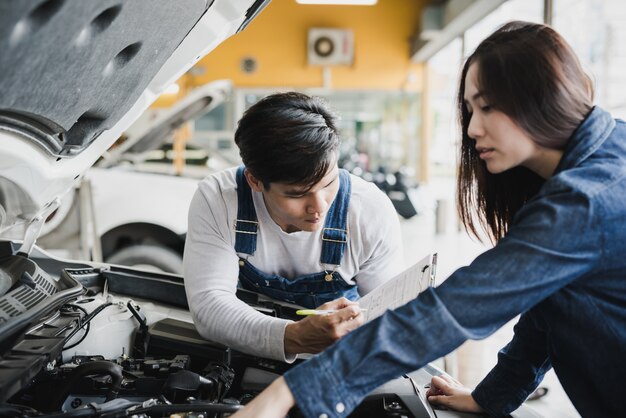 Reliable Auto Mechanics >> Reliable Auto Mechanic Talking To A Female Customer Photo Reliable Auto Mechanics >> Reliable Auto Mechanic Talking To A Female Customer Photo