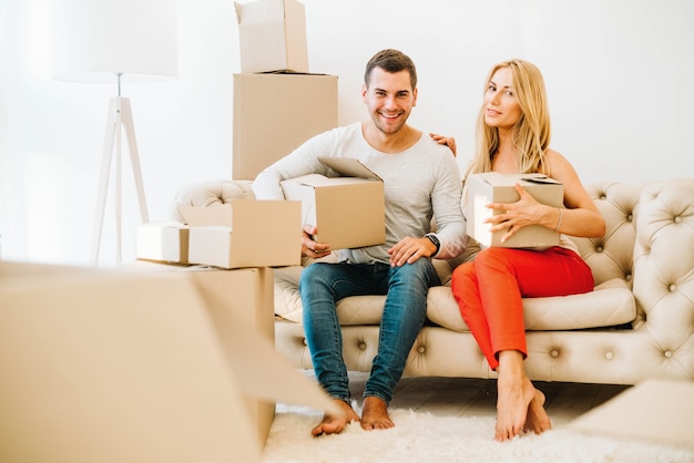 Relocating couple on couch together