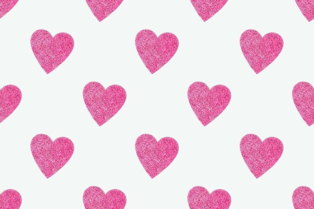 Free photo repetitive pattern made of pink hearts