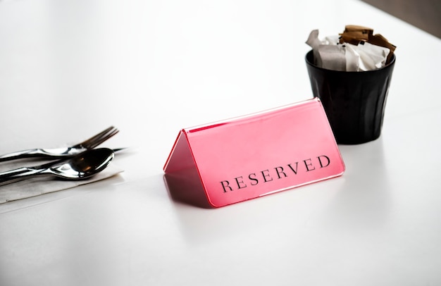 Free photo reserved dining table