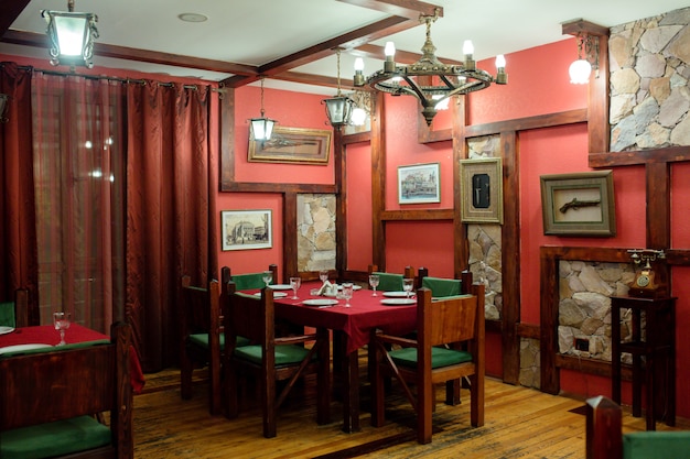 Restaurant room with paintings on walls