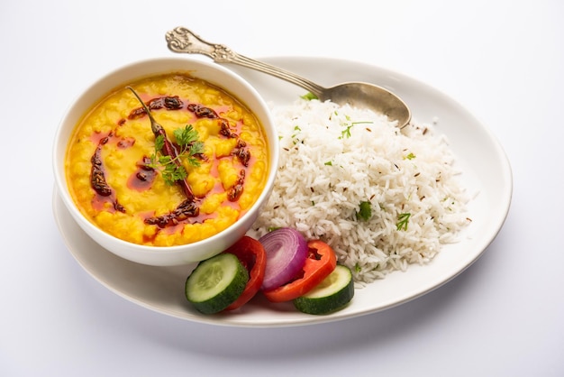 Restaurant style dal tadka tempered with ghee and spices! this recipe makes a great meal with boiled rice