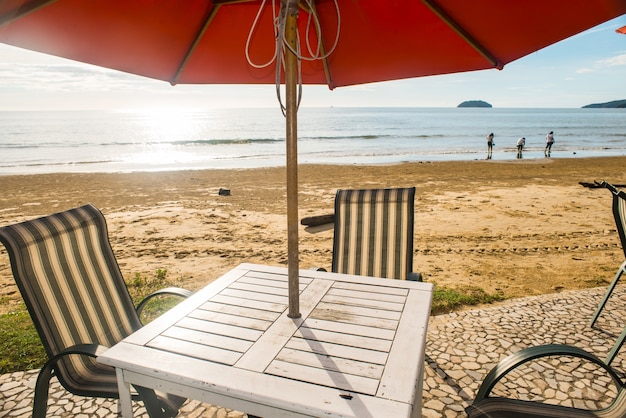 Free photo restaurant table at the beach