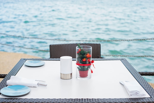 Free photo restaurant table at sea